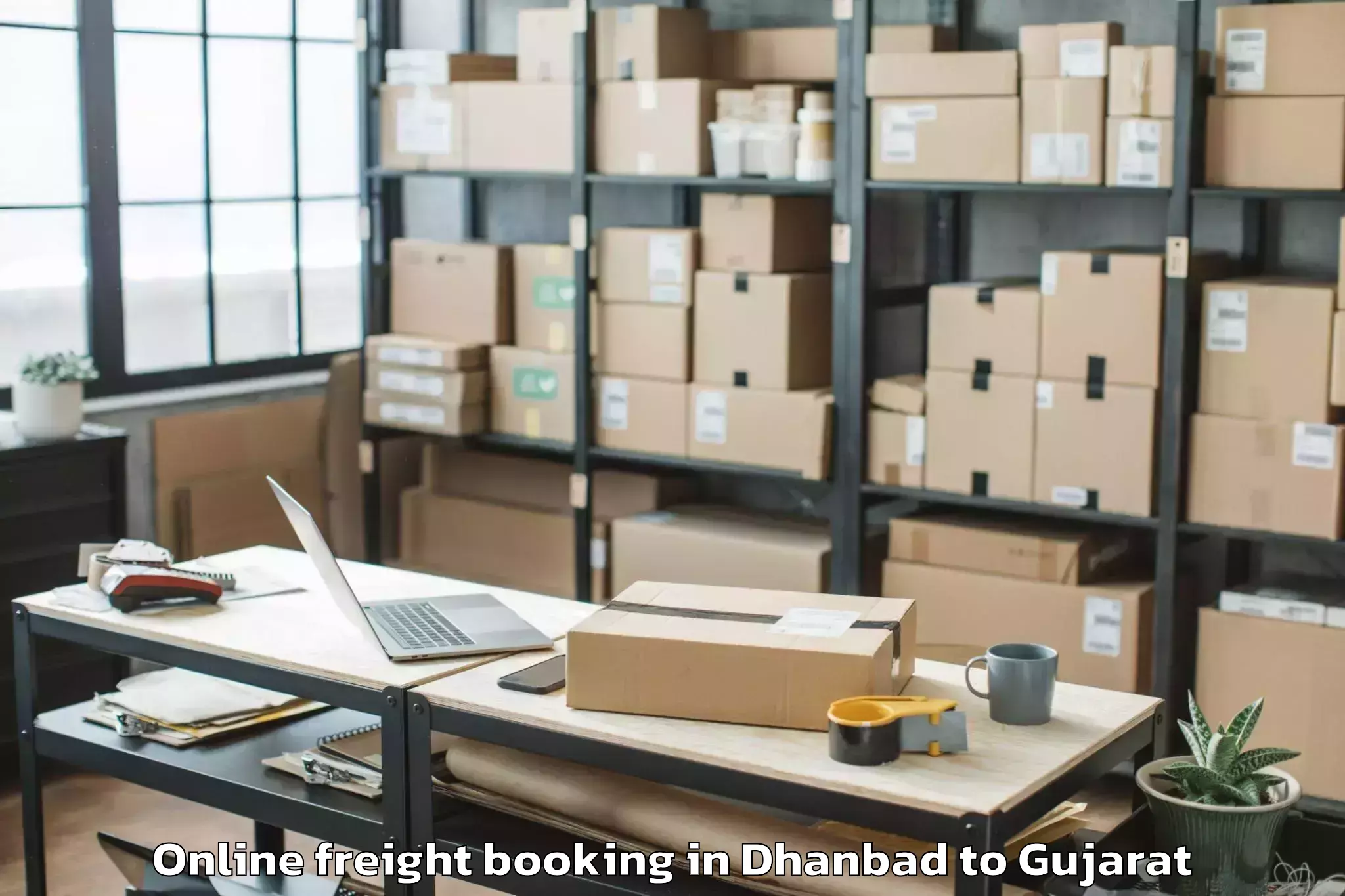 Reliable Dhanbad to Kavant Online Freight Booking